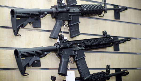 Assault style Rifles on a wall display